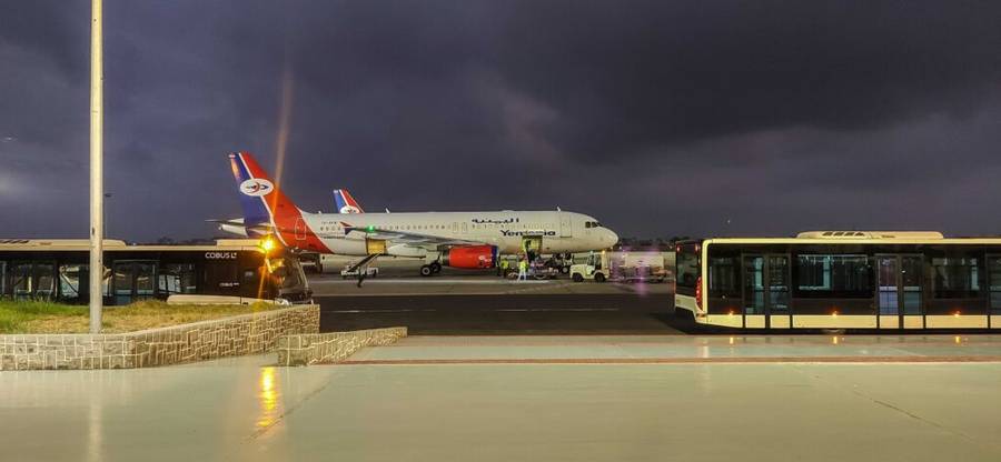 Yemenia Airways plane on the tarmac at Socotra Airport at dusk